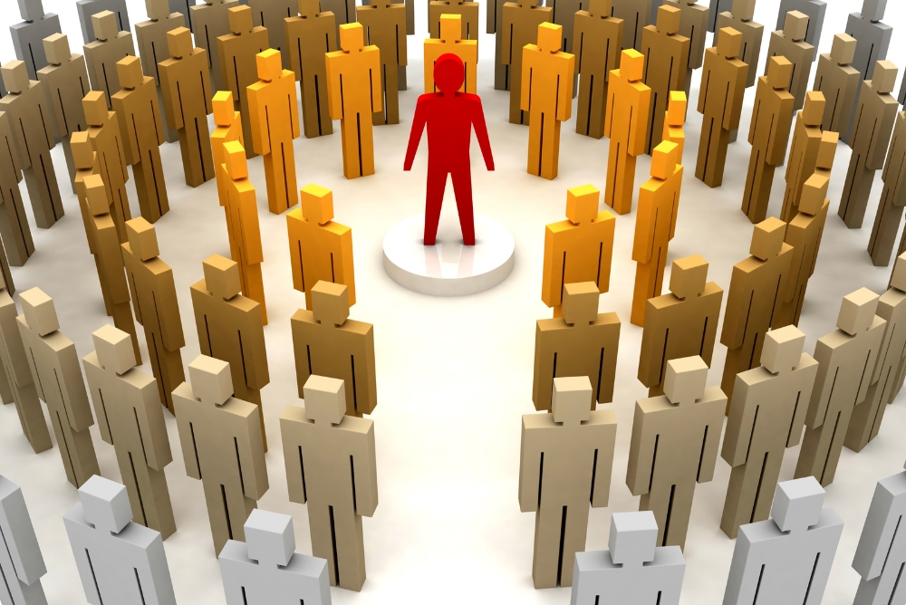 Leader standing in the middle of a crowd