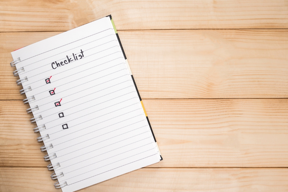 A plain ruled paper with checkboxes