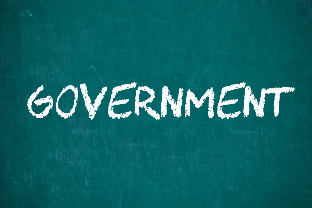 A board with the word Government Written on it