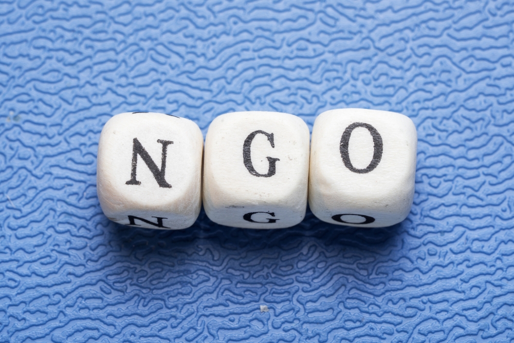 The word NGOs on scrabble